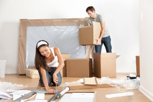 Man with van loading items safely into a vehicle