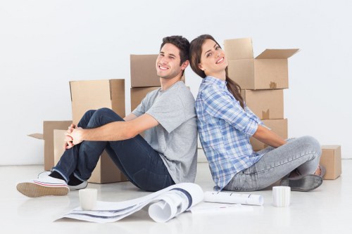 Removal team planning a flat move in a Surrey apartment block