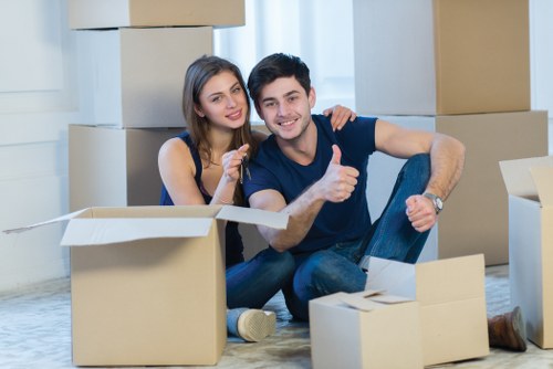 Man and van service preparing boxes and furniture for collection in Surrey