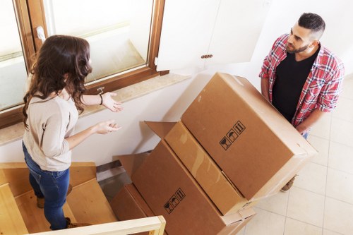 Local movers handling a residential relocation on a Surrey street