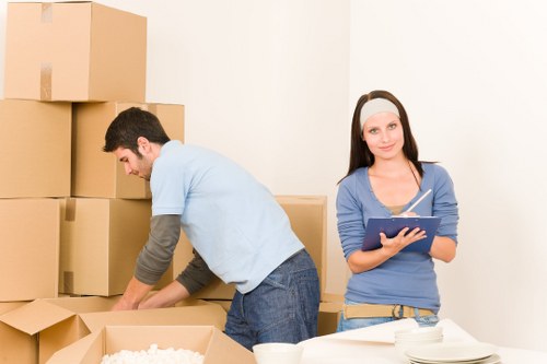 Careful delivery and placement of a piano in a Surrey home