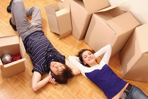 Student move-out preparation with labelled boxes and luggage in Surrey