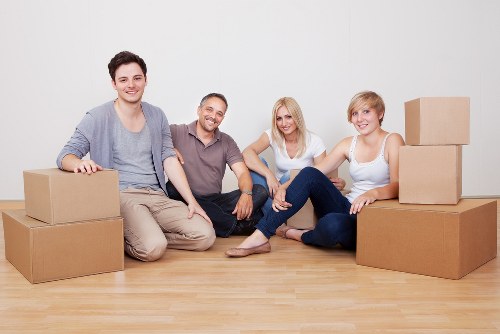 Commercial furniture and equipment prepared for transport during a Surrey office move