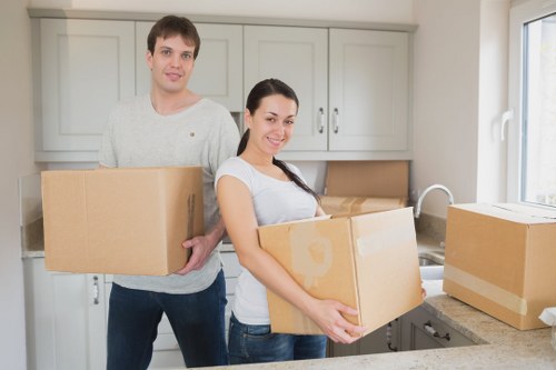 Packed boxes and furniture prepared for Surrey removals